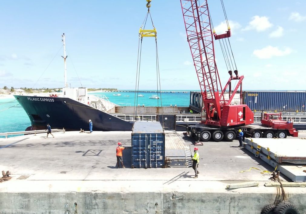 Containers being worked alongside at South Dock